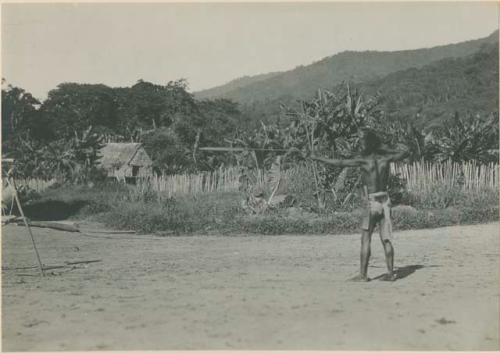 Batak man with bow and arrow