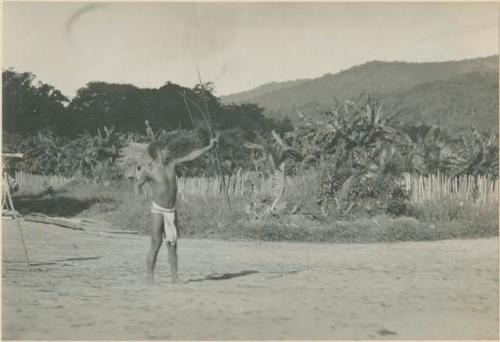 Batak man with bow and arrow