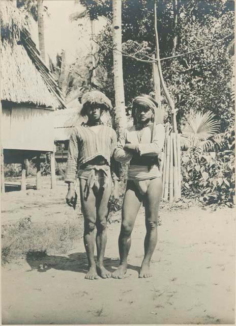 Two young Tingian warriors