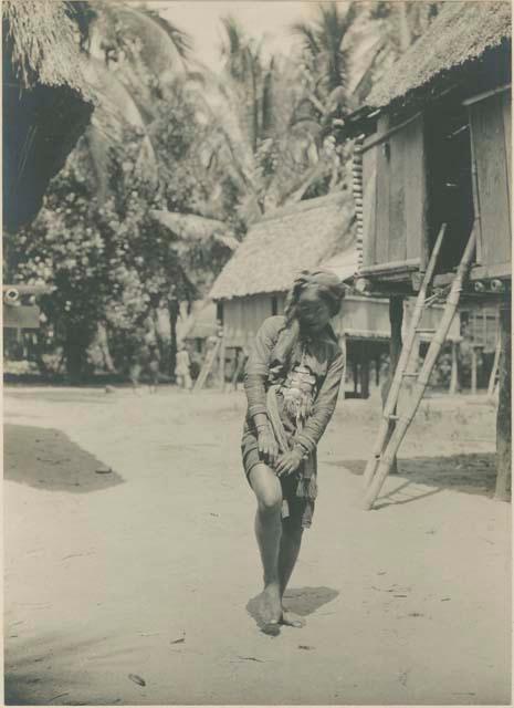 Young Tingian woman rolling cigar on thigh