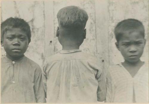 Three school boys of Cuyo