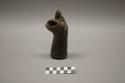 Ceramic, flat bottomed black vessel with zoomorphic (reptile?) applied to opening