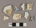 White pearlware vessel body fragments, light buff paste, 2 fragments with blue transferprinted decoration
