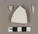 White undecorated porcelain vessel body fragments