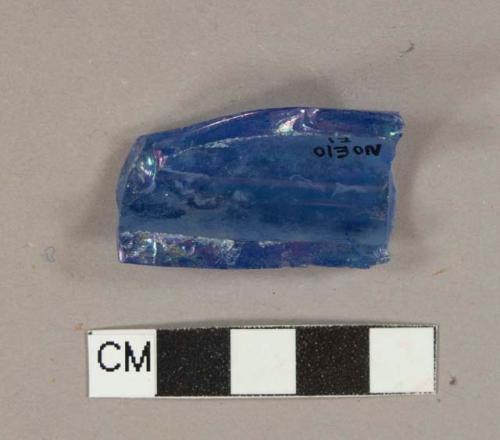 Cobalt blue glass vessel fragment, likely neck fragment