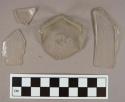 Colorless glass vessel body, base, and rim fragments