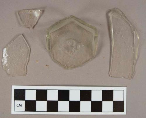 Colorless glass vessel body, base, and rim fragments