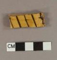 Earthenware, lead glazed, North Midlands type, rim sherd ; yellow slip decoration, piecrust rim