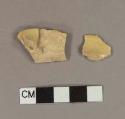 Staffordshire slipware body sherds with handle attachment; two sherds crossmend