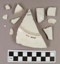 Whiteware vessel bodt fragments, 1 base fragment, base fragment with partial blue stamp "...Mc D.. / BOST.."