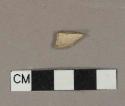 Unsmoked pipe bowl fragment with incised line around rim