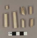 Unsmoked, undecorated pipe stem fragments; 6/64" bore diameter; two fragments crossmend; two fragments crossmend; two fragments crossmend