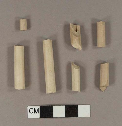 Unsmoked, undecorated pipe stem fragments; 6/64" bore diameter; two fragments crossmend; two fragments crossmend; two fragments crossmend