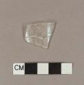 Glass, rim fragment; clear leaded, acid etched;crossmends with (2008.22.1247)