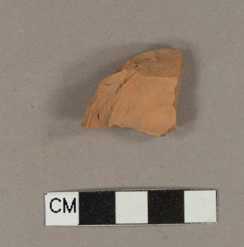 Unglazed, undecorated redware base sherd