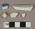 White pearlware vessel body fragments, blue transferprint