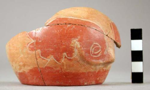 Partial ceramic bowl, red on orange, bird motif, node, mended.