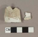 Undecorated whiteware base sherds; two sherds crossmend