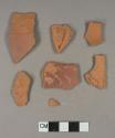 Unglazed, undecorated redware body sherds; three sherds crossmend