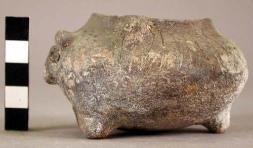 Small pottery tripod effigy bowl - incised and punctate decoration; 2 horizontal