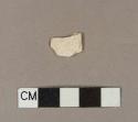 Refined earthenware body sherd, missing finish from both sides