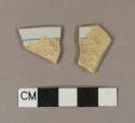 Blue hand painted tin glaze earthenware rim sherds; two sherds crossmend