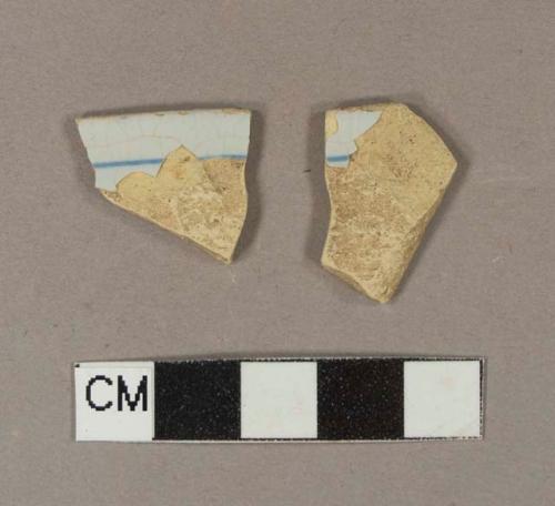 Blue hand painted tin glaze earthenware rim sherds; two sherds crossmend