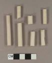 Unsmoked, undecorated pipe stem fragments; two fragments crossmend; 5/64" bore diameter