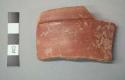 Pucara polished red potsherds