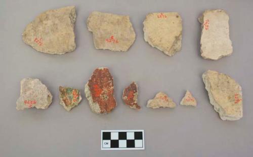 Fragments of painted stucco coating