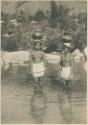 Tinguian women carrying water at stream