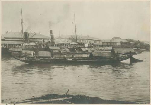 View of boats on the Pasig River from the south bank