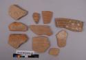 10 potsherds - decorated red ware