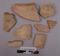 8 potsherds - red ware, cream clip