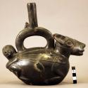 Black ware effigy stirrup vessel