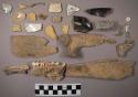 Bone, nails, glass fragments china fragments