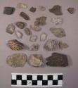 1 coarse ware potsherd; 50 chunks and flakes of quartz; 33 chips and flakes of m