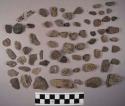 Approx. 150 pieces of stone; 2 glass fragments