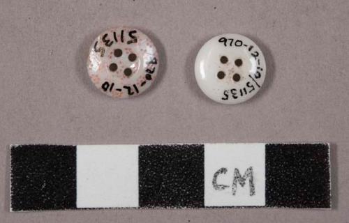 2 four-hole milk glass buttons, 1 decorated