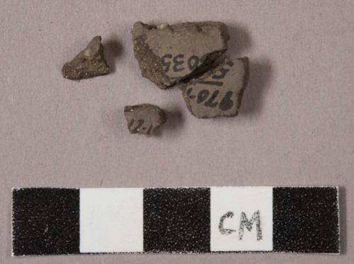 58 stone chips; 2 potsherds; approx. 21 glazed potsherds; 4 fragments of glass;