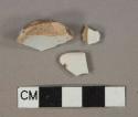 White tin-glazed earthenware vessel body fragments, buff paste