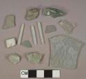 Aqua glass fragments, 5 vessel fragments, 8 flat glass fragments