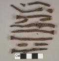 Ferrous metal nail fragments, 1 loop hook, 3 unidentified