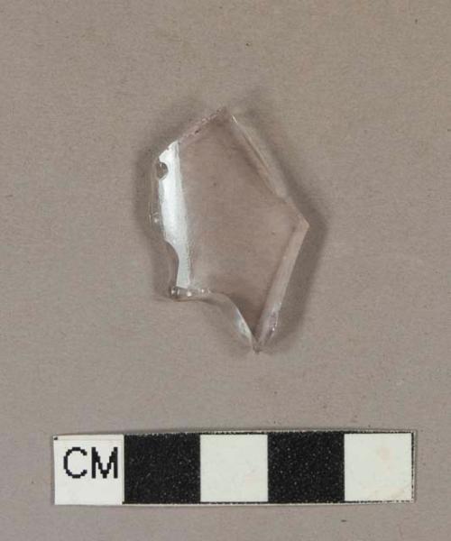 Purple-tinted colorless bottle glass fragment