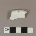 Undecorated whiteware rim sherd; could also possibly be a base sherd