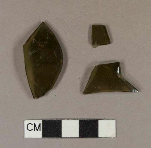 Olive green bottle glass fragments; two fragments crossmend