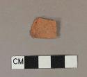 Redware body sherd, missing finished surface on both sides