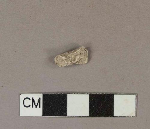 Possible white plaster fragment