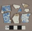 Blue on white transferprinted earthenware vessel body and rim fragments, white paste
