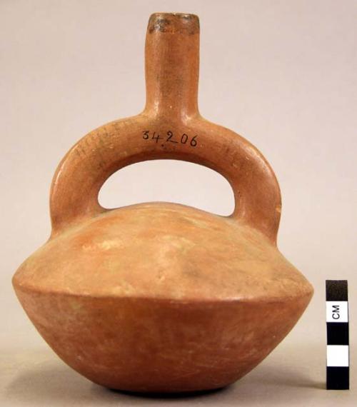 Red pottery jar, mouth on hollow handle